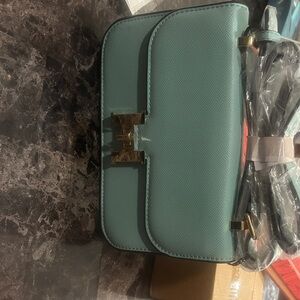 Chic Teal Crossbody Bag with Gold Accents